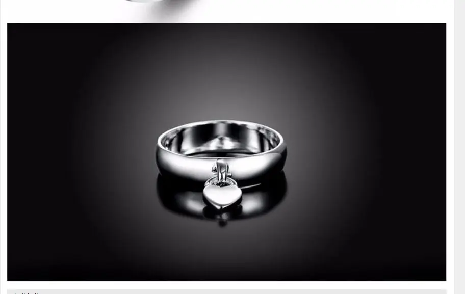 Lady hanging heart lock ring