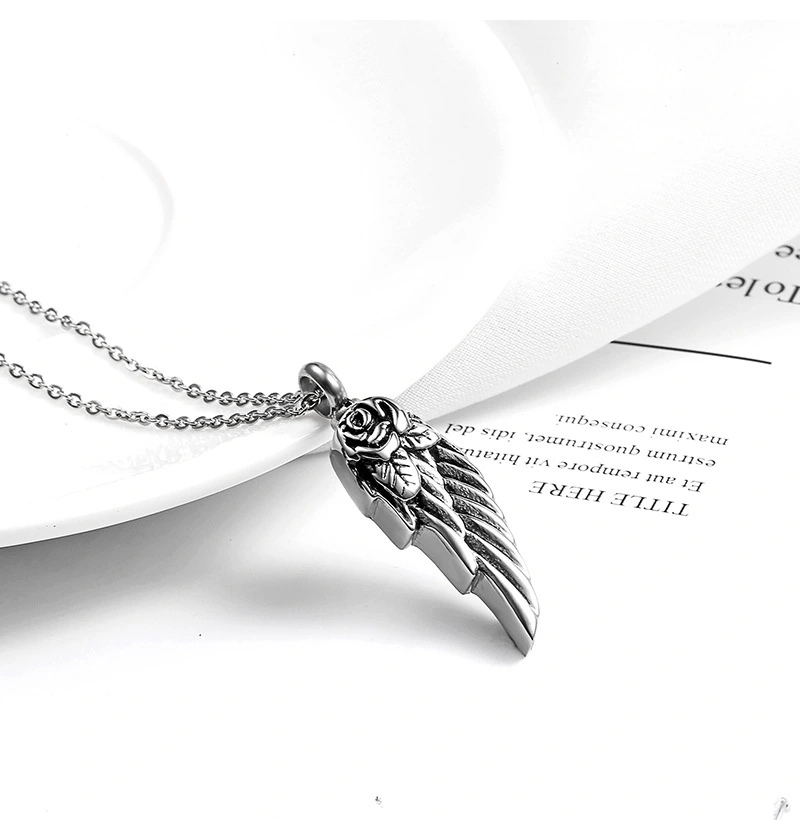 Angel wings perfume bottle pendant