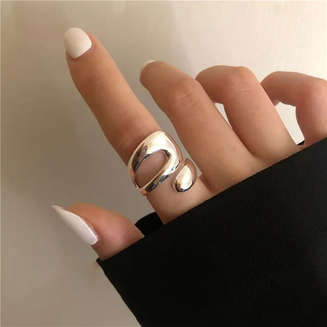 Staggered hollow tide personality irregular curve ring