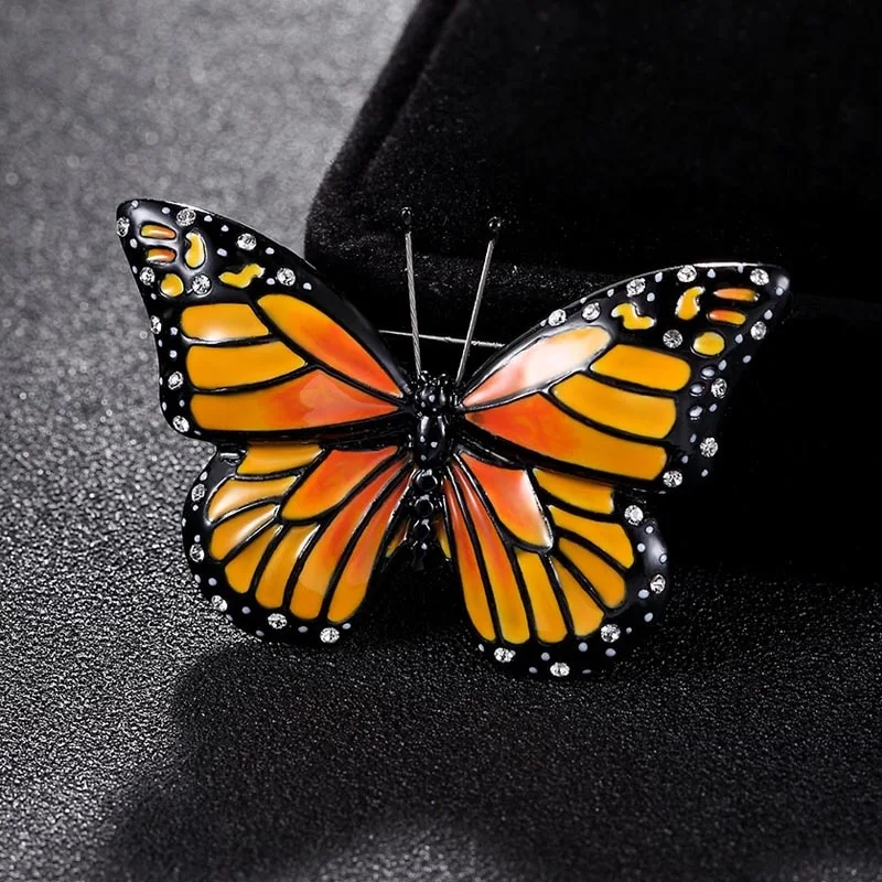 Rhinestone drip brooch butterfly pin