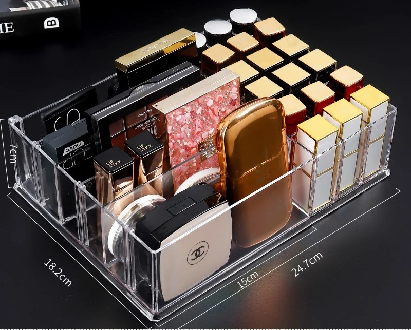 Cosmetic storage box with eye shadow tray and lipstick