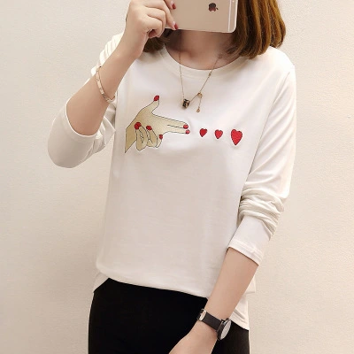 2021 female New Year's new women's clothing, Korean long sleeves, finger sleeves, finger patterns, female students' tops