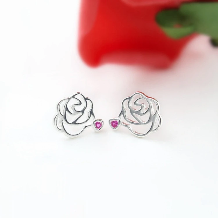 Openwork rose earrings