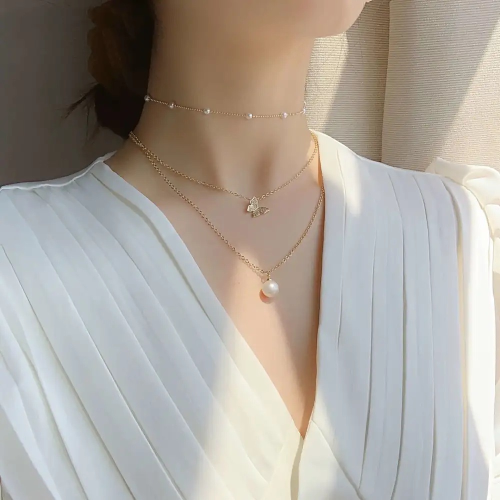 Multi-layered butterfly pearl necklace