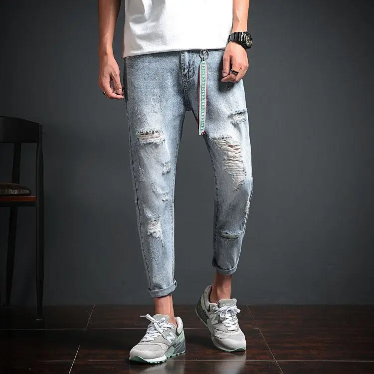 STRETCH DISTRESSED DENIM