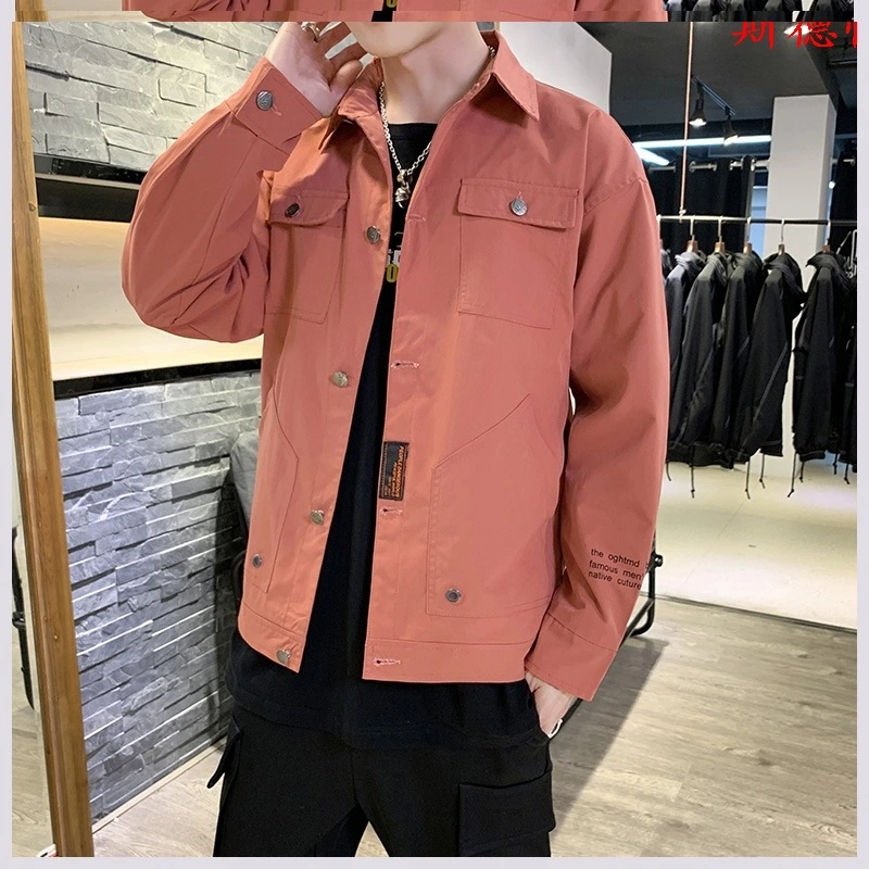 Handsome male in student overalls