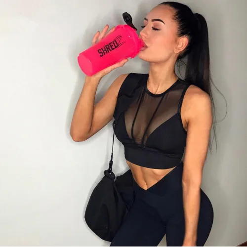 The new 2021 foreign trade eBay women's European and American sexy mesh stitching elastic vest sportswear