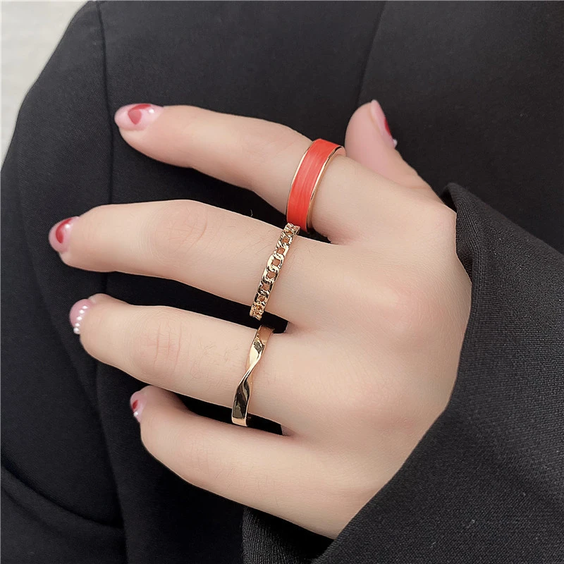 A Set Of Three Combination Drip Rings