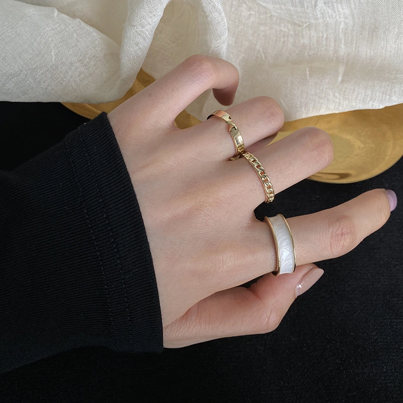 A Set Of Three Combination Drip Rings
