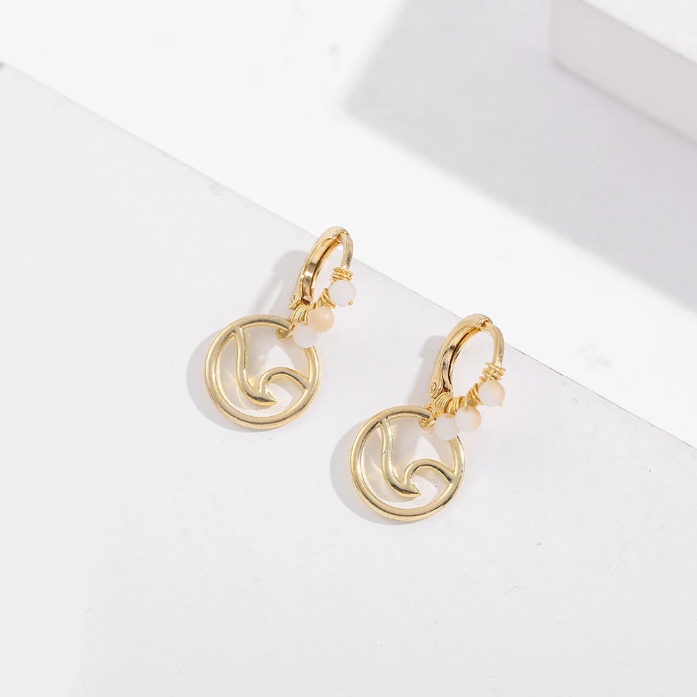 Retro New Alloy Round Hollow Rice Bead Winding Earrings