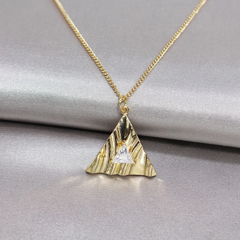 Golden Extruded Triangle Inlaid Zircon Pendant