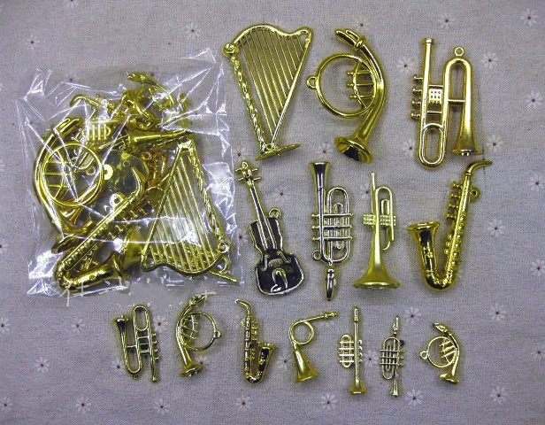 Bags Of Electroplated Gold And Silver Small Musical Instruments