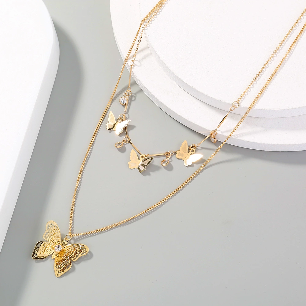 Multi-layered butterfly pendant necklace with tasselled Zircon