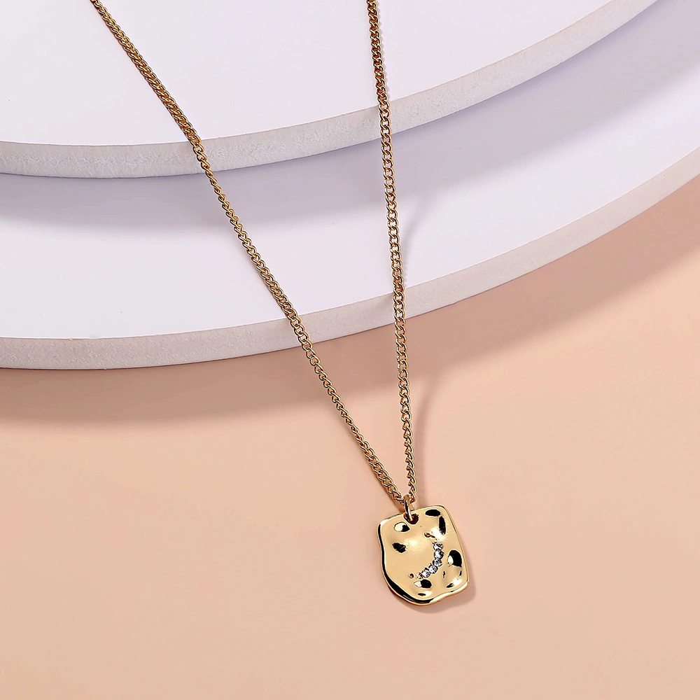 Irregular tag necklace with diamond inlay