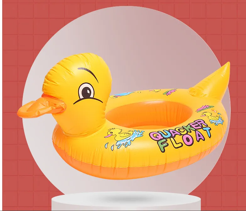 Yellow Duck Swims In A Boat With Inflatable Toys