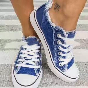 Distressed low-top canvas shoes