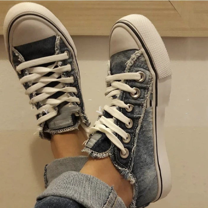 Distressed low-top canvas shoes