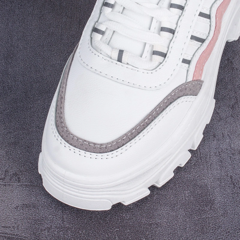 Small white shoes with thick soles