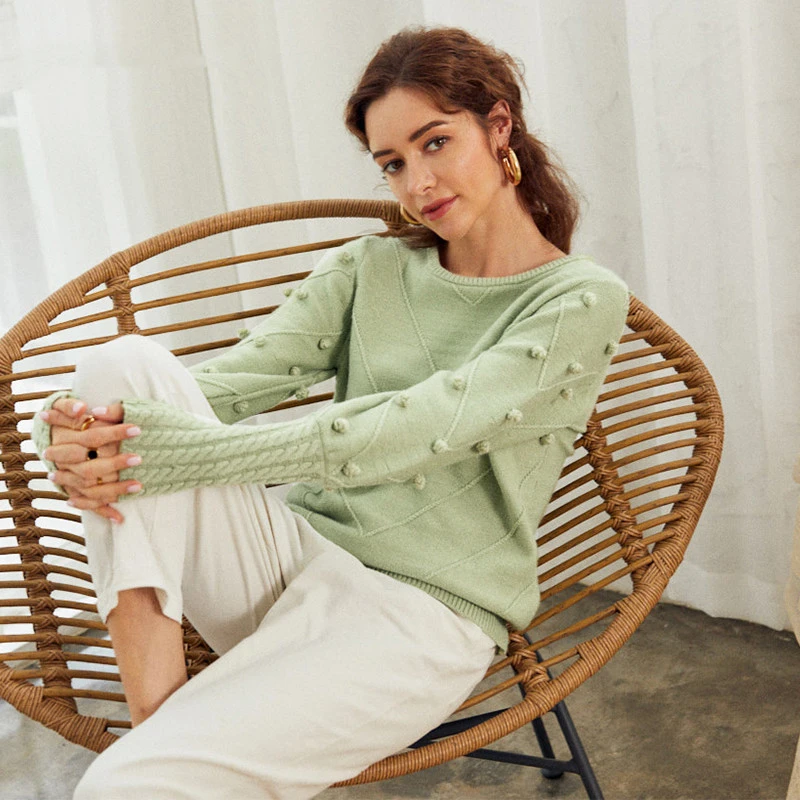 Women's solid color round neck wool ball sweater