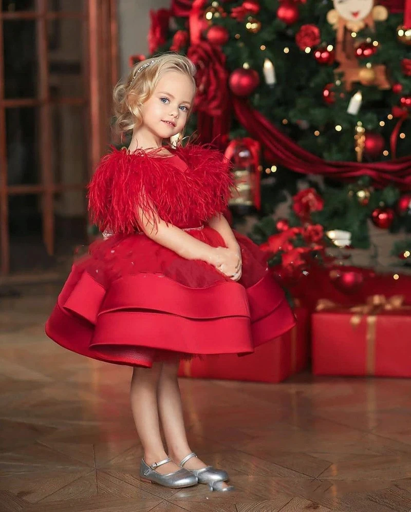 Girl's red feather dress