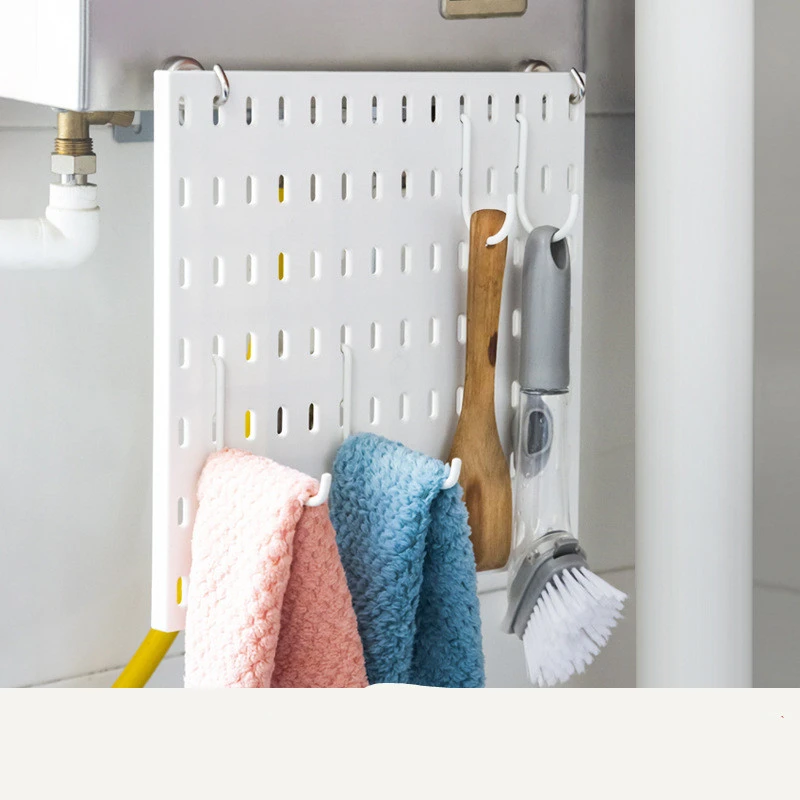 Covering The Kitchen With Exposed Pipes, Pipe Holes And Plates