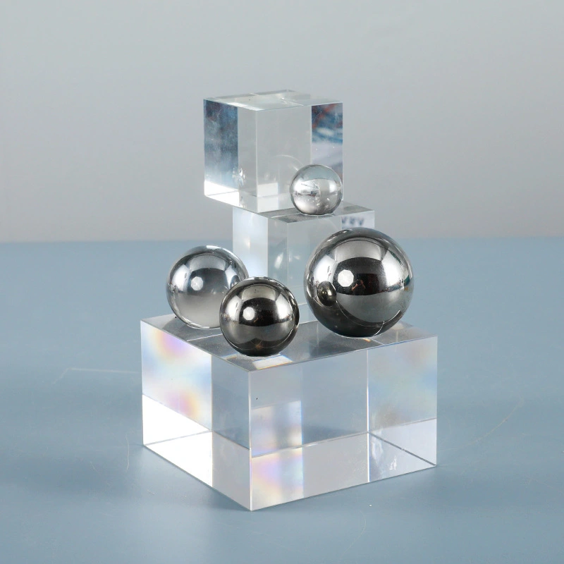 glass cubes and gold or silver spheres