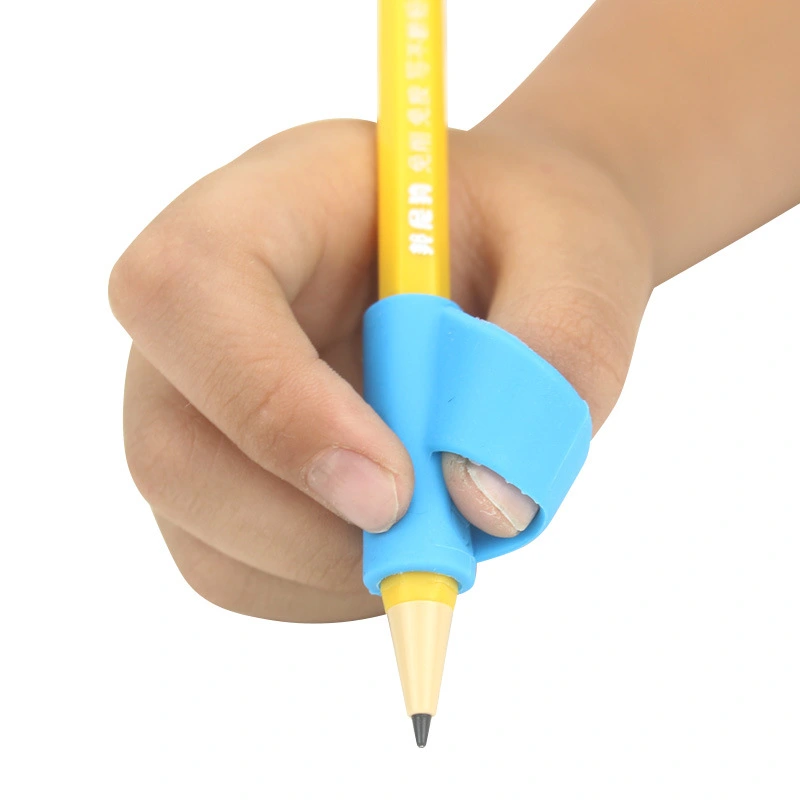 Elementary school students holding pen orthosis