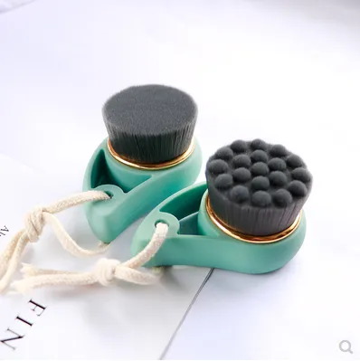 Manual bamboo charcoal comma facial cleansing brush