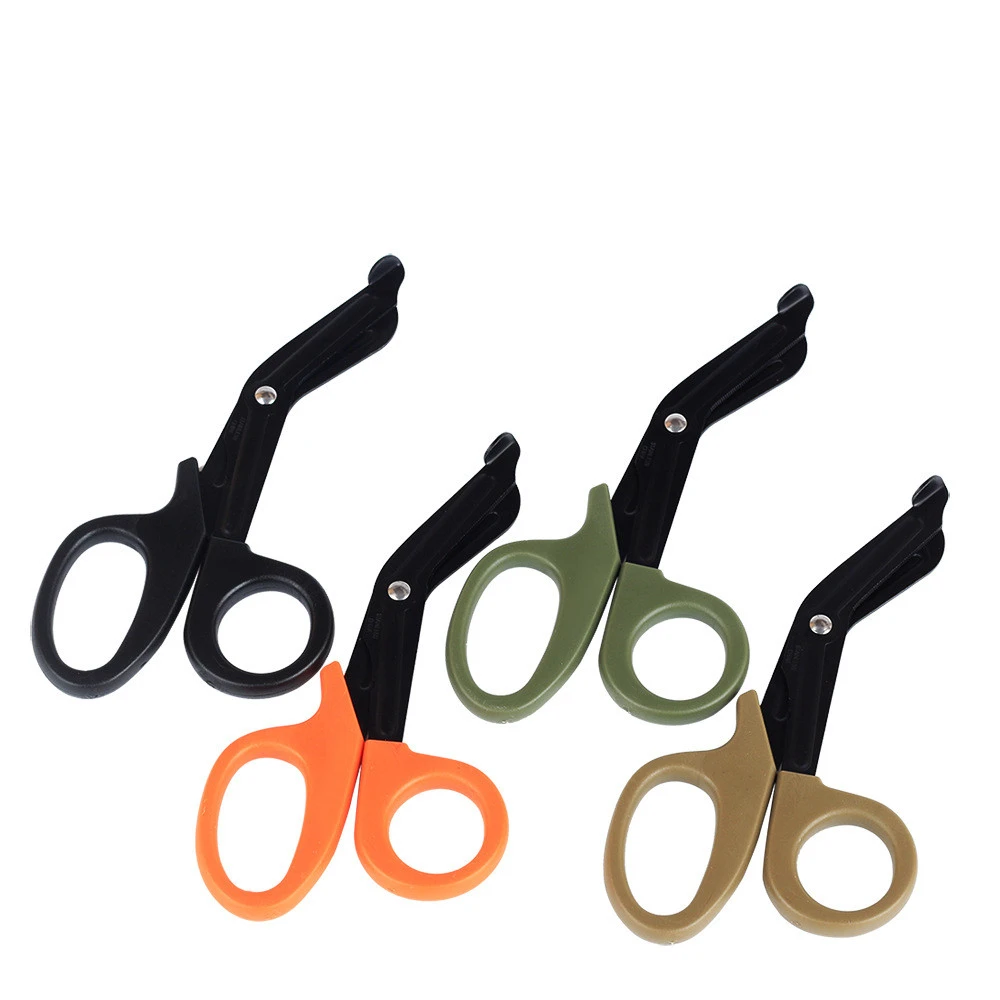 Wilderness survival equipment with tooth rescue scissors