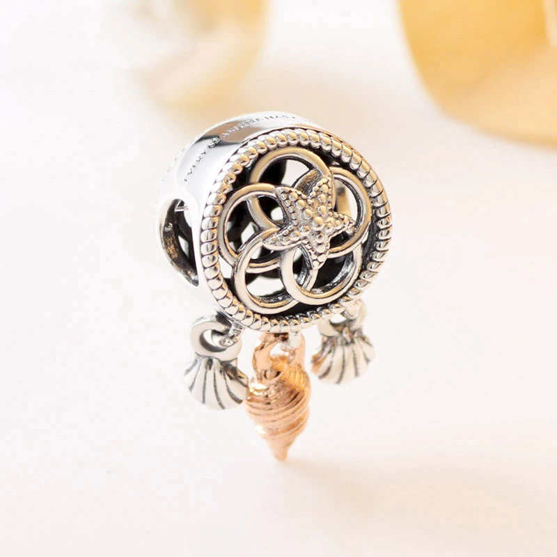 Hollow shell dream catcher charm