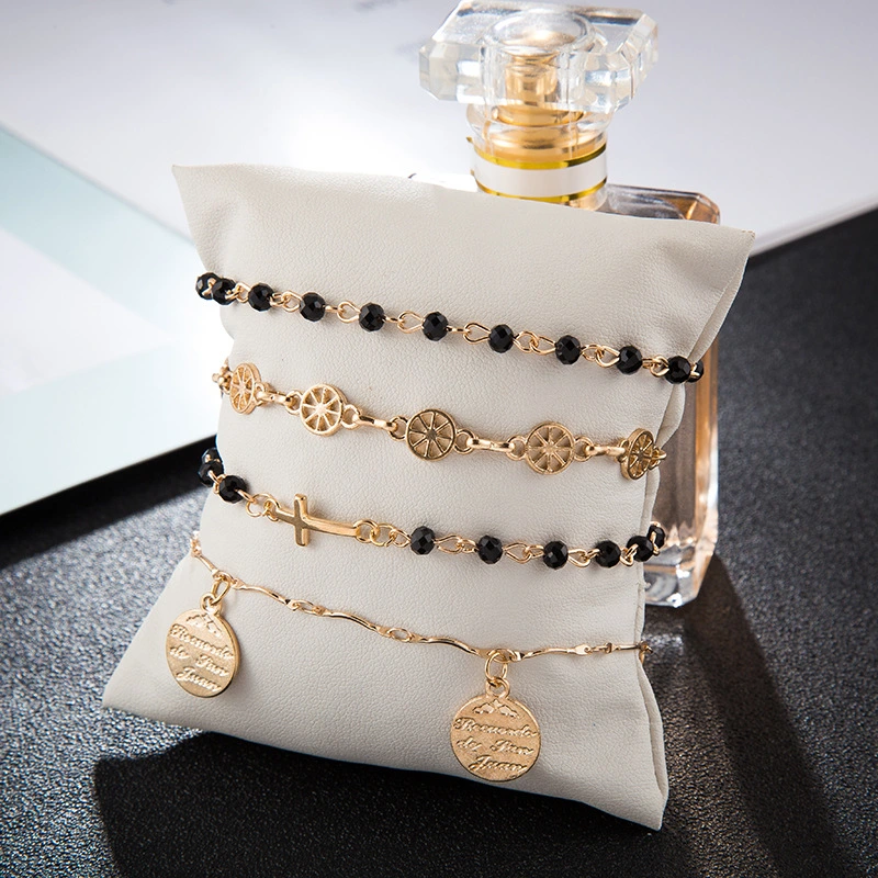 Four-piece alloy cross bracelet