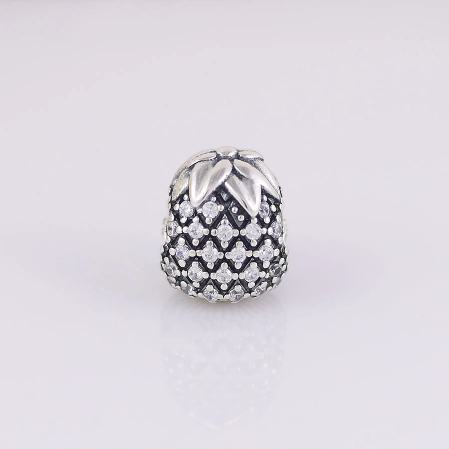 Pineapple and pineapple beads inlaid with stone