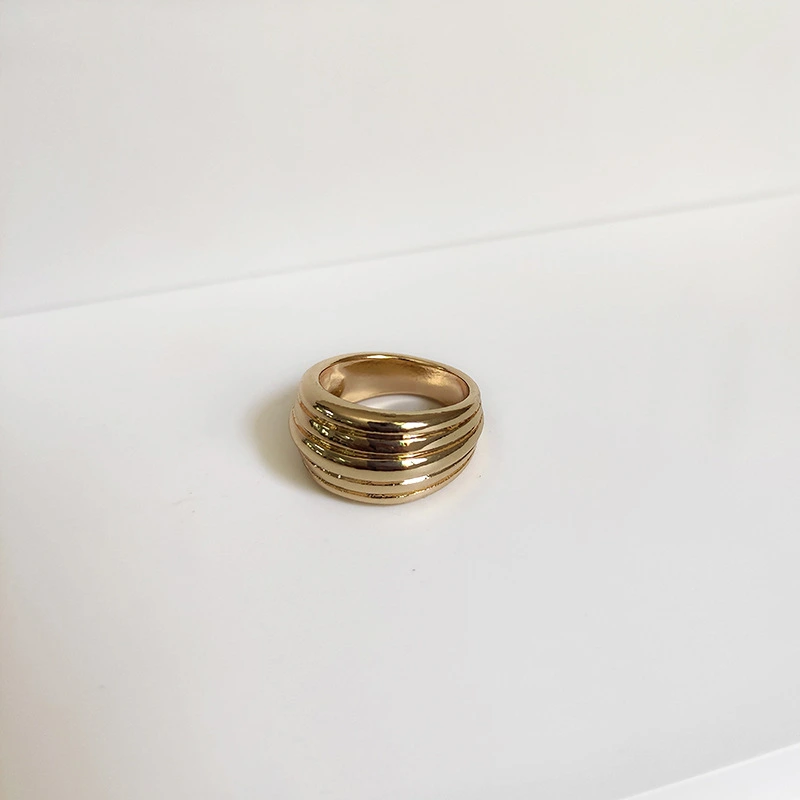 Irregular gold and silver ring