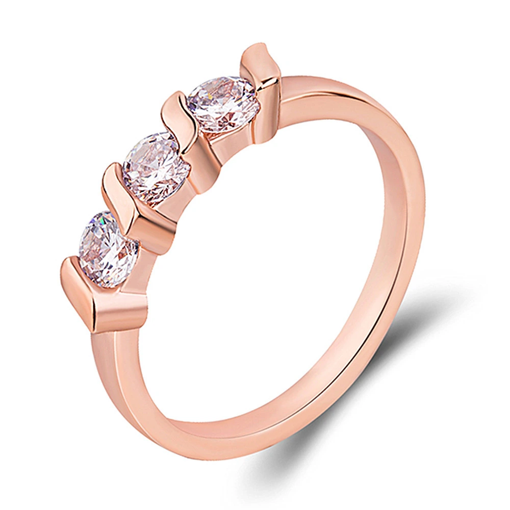 Three-stone ring with diamonds