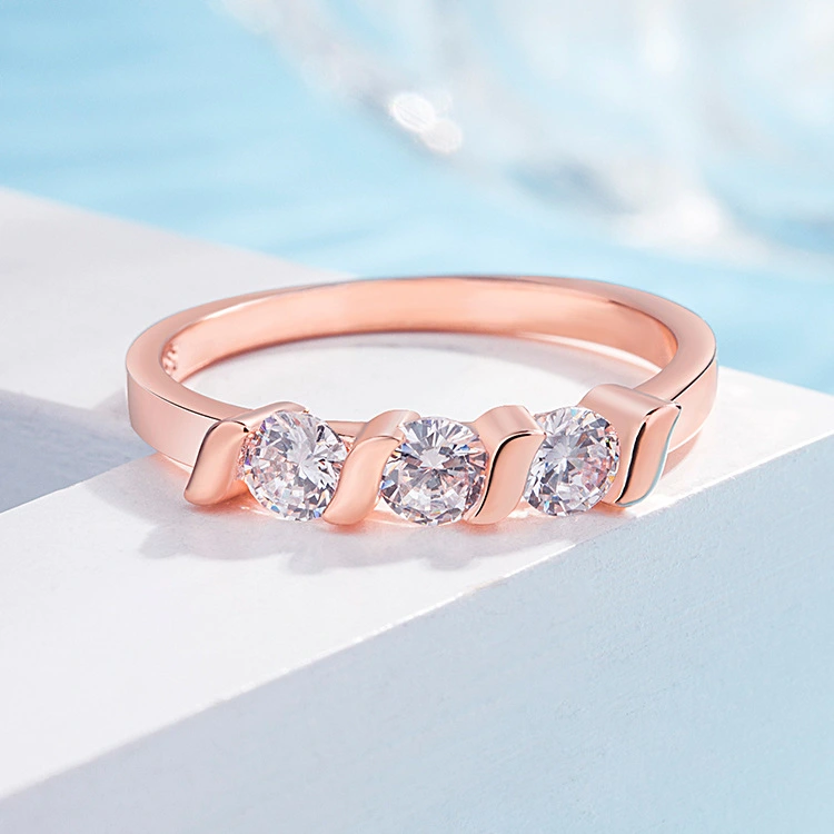 Three-stone ring with diamonds