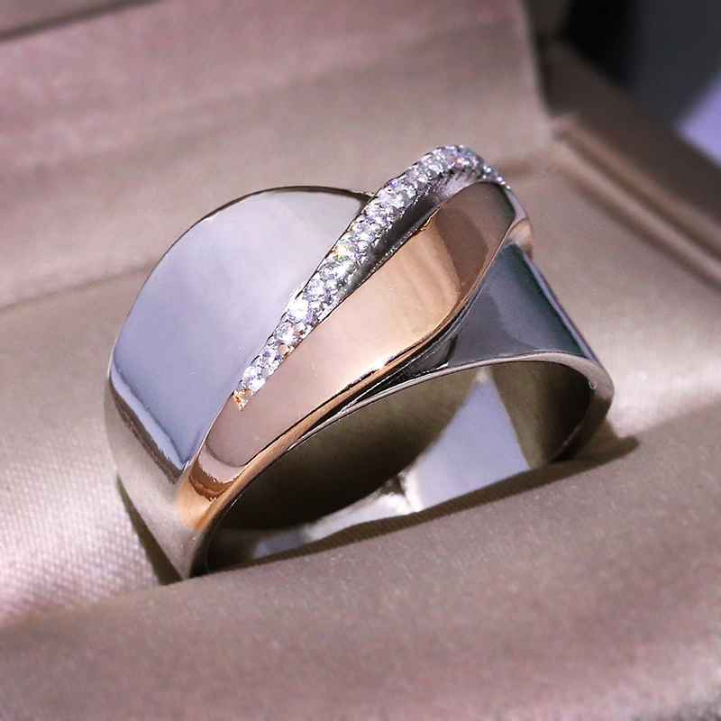 Rose gold two-tone bow cross ring