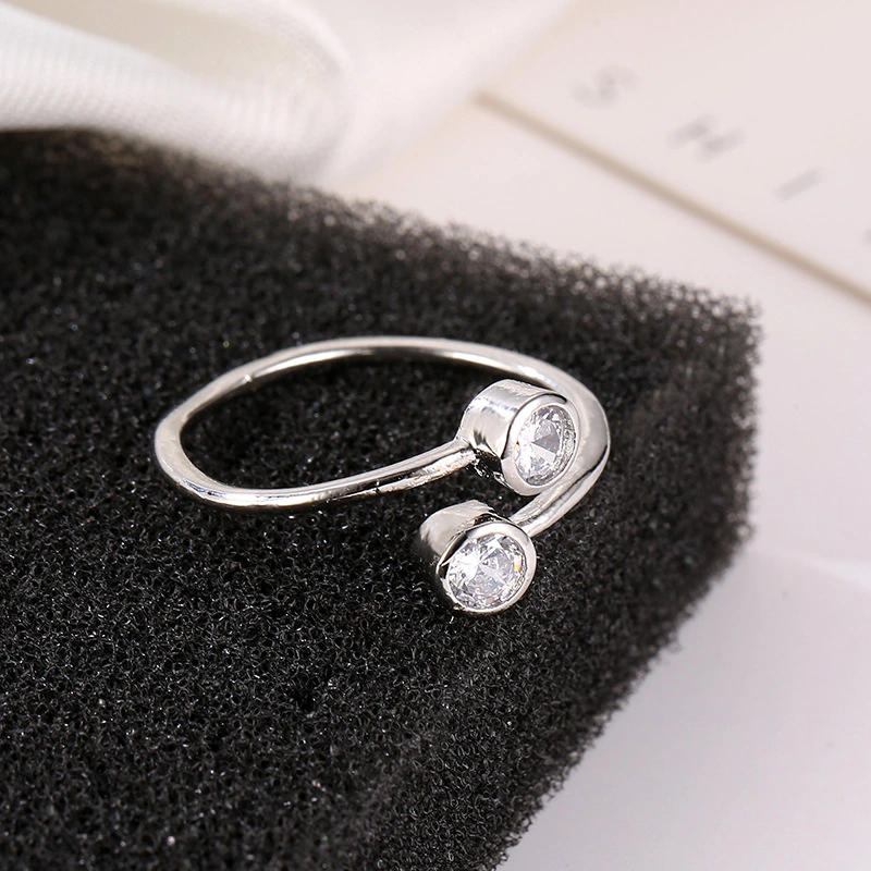 Copper inlaid zircon ring