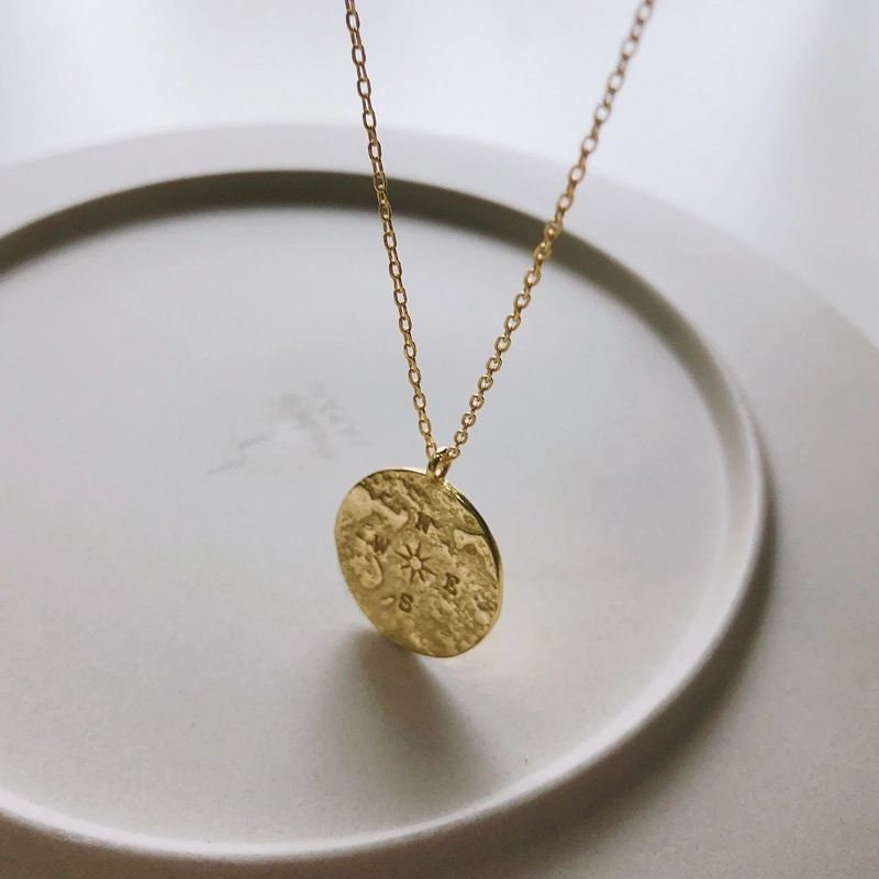 The compass map necklace