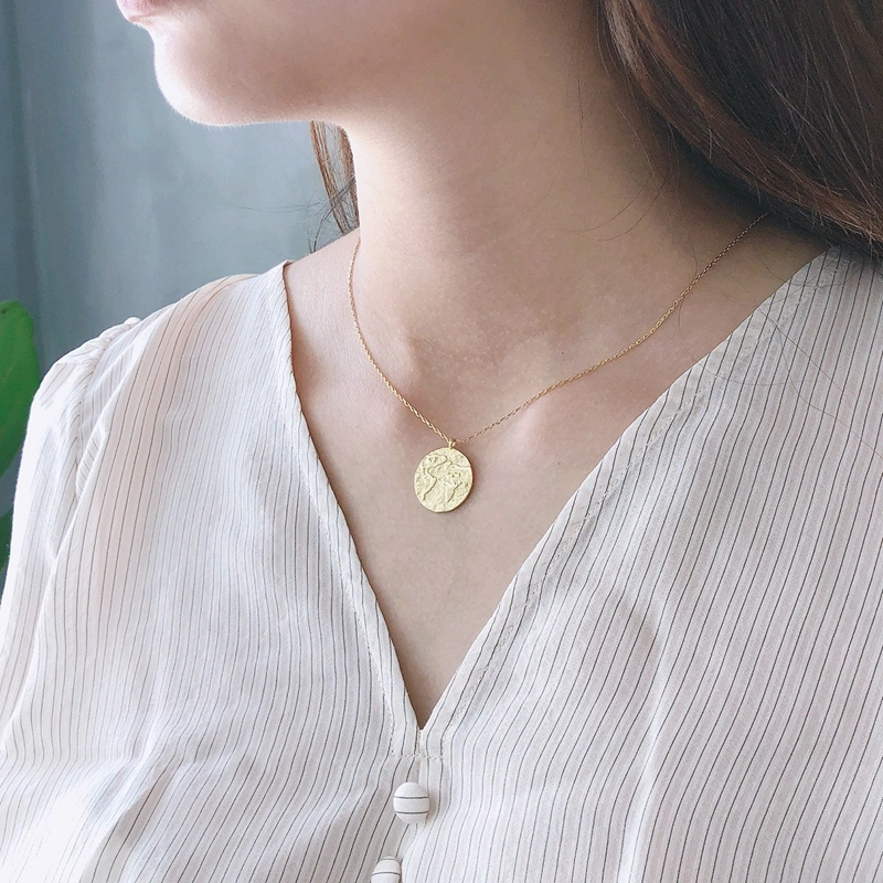 The compass map necklace