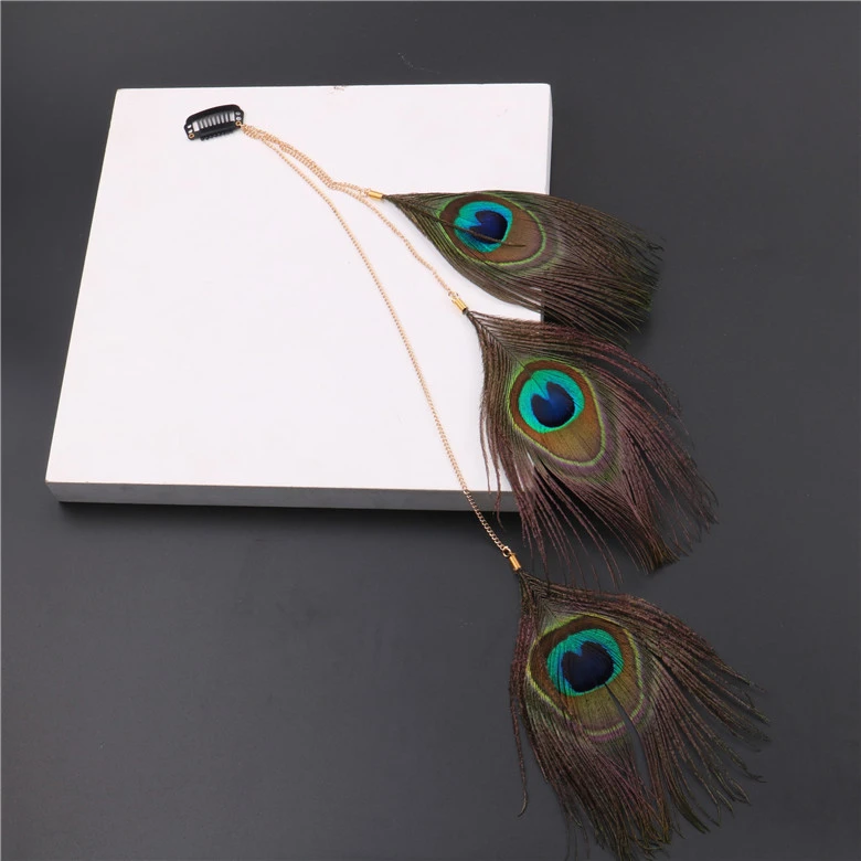 Handmade peacock feather hair accessory