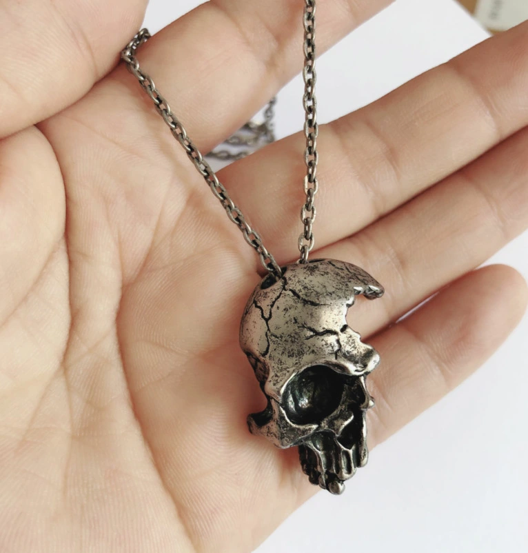 Vintage half face skull necklace