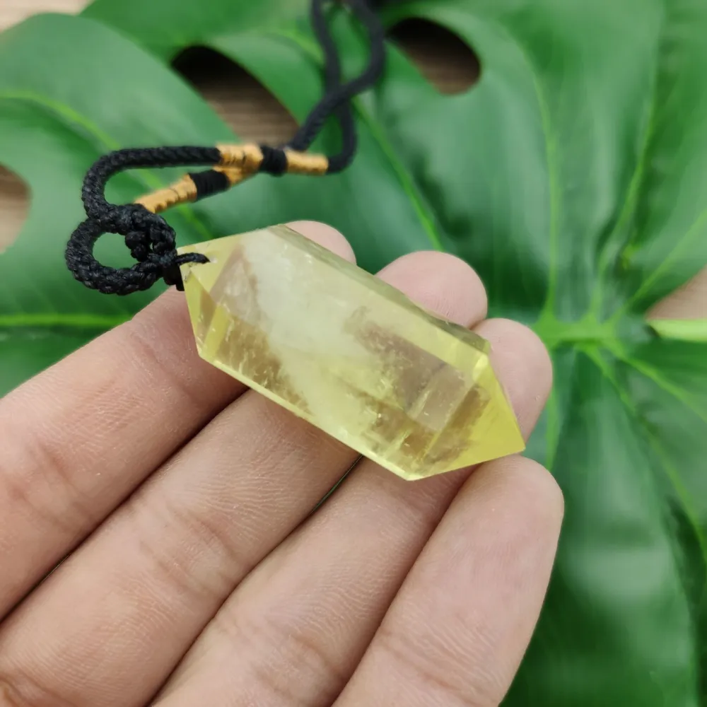 Double pointed crystal pillar polyhedron pendant