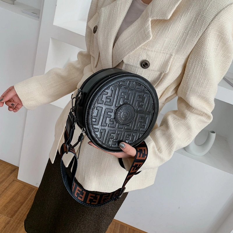 Crossbody small round bag