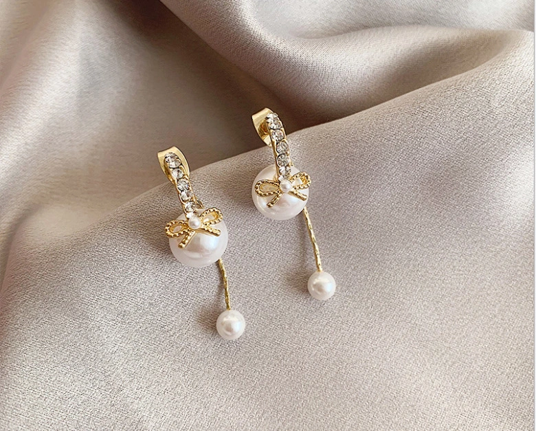 Women's Long Bow Pearl Stud Earrings