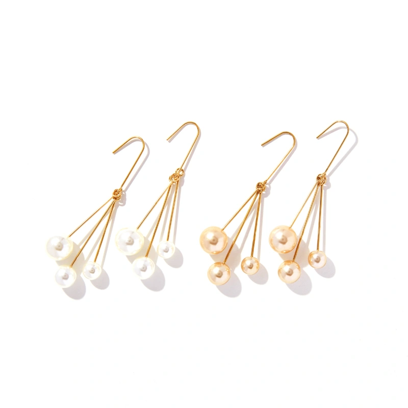 Women's asymmetric pearl earrings