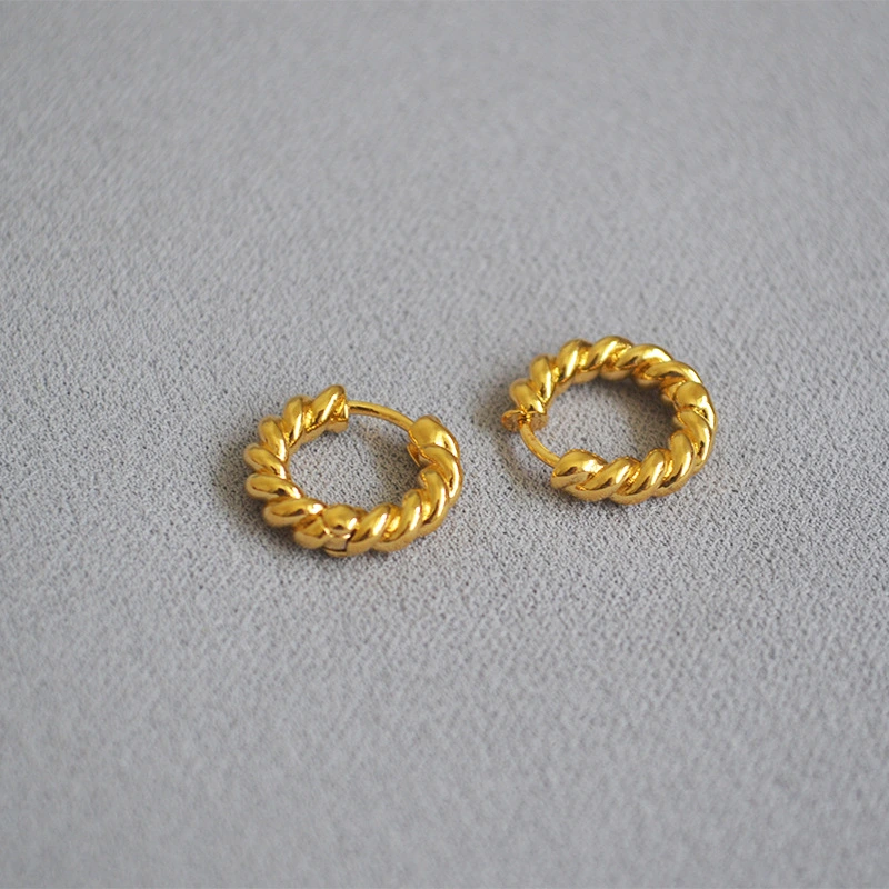 Brass gilded twist round earrings