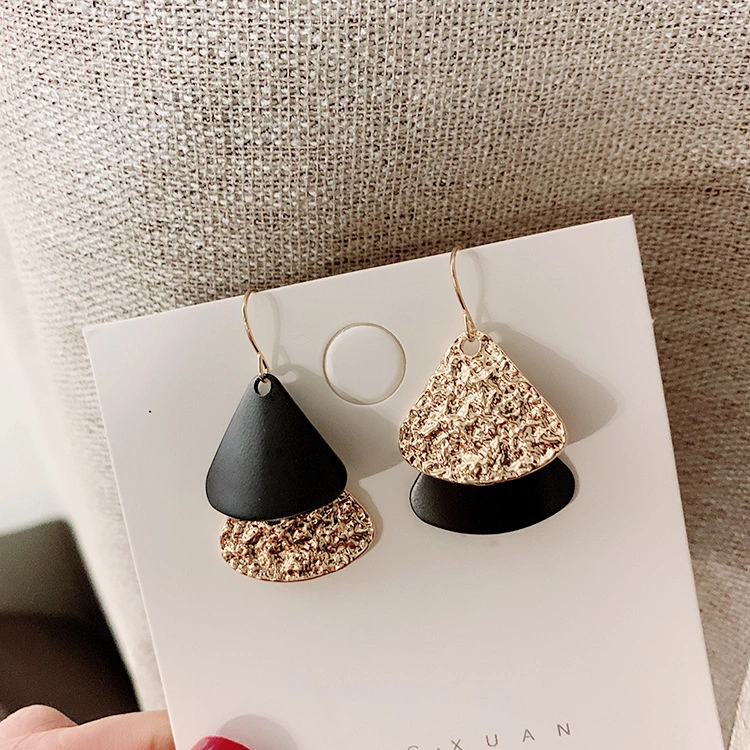 Asymmetrical metal fan-shaped earrings