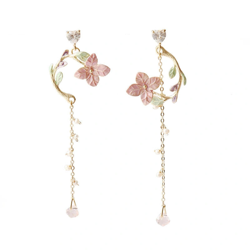 Long asymmetric pearl earrings