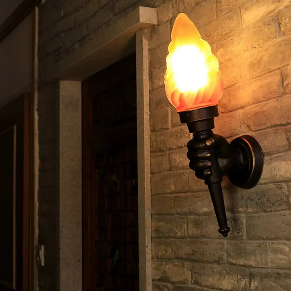 Creative torchbearer wall lamp