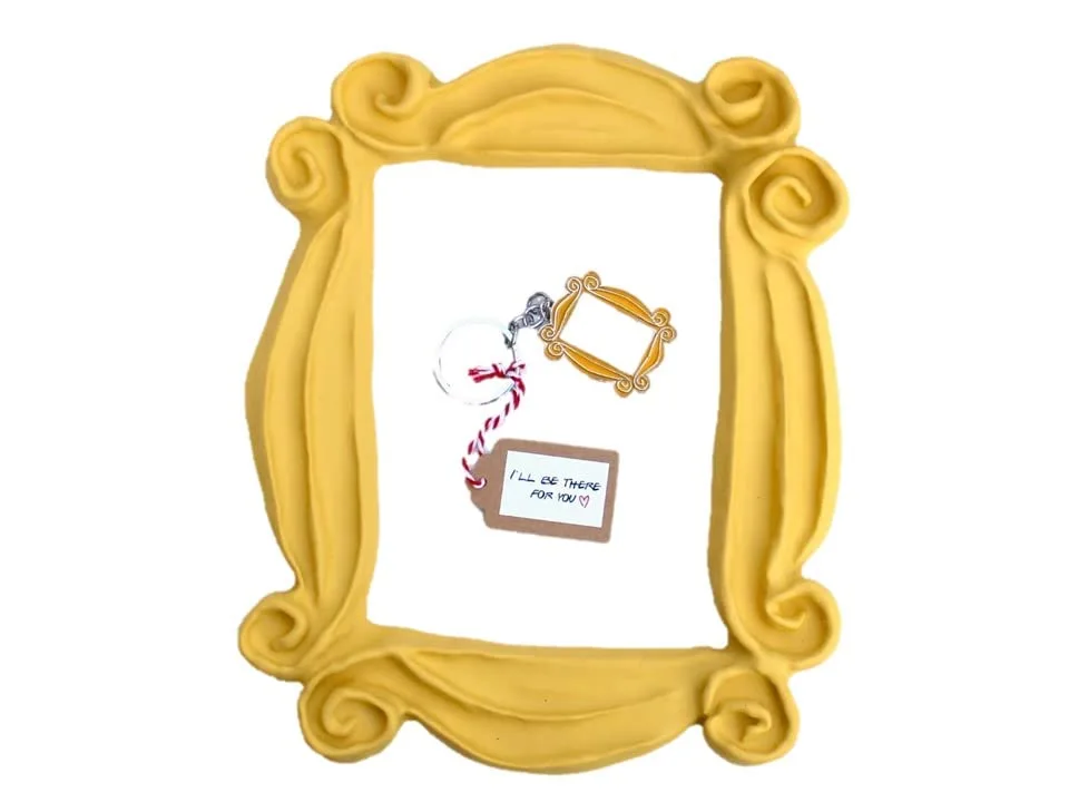 Handmade with Love by Fatima. Yellow Frame and a cute Keychain. Frame peephole door. This is a handmade replica. Great present for your Friends.